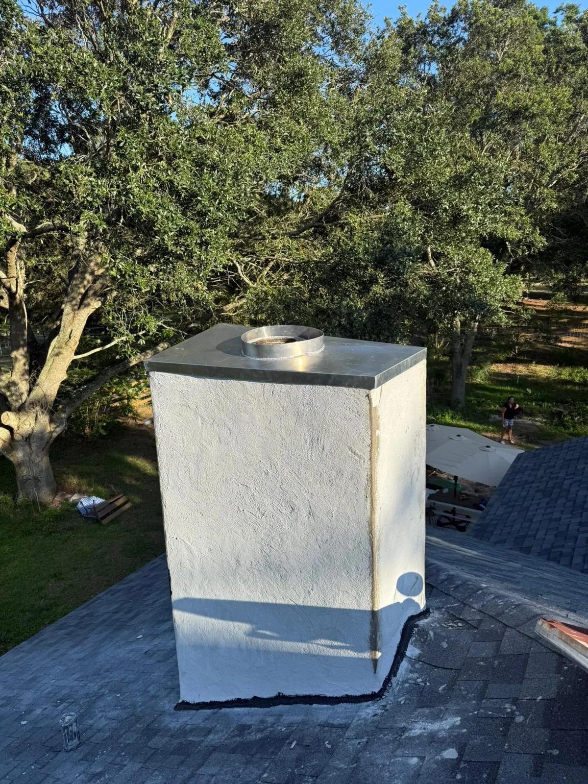 Freshly waterproofed and re-coated chimney chase